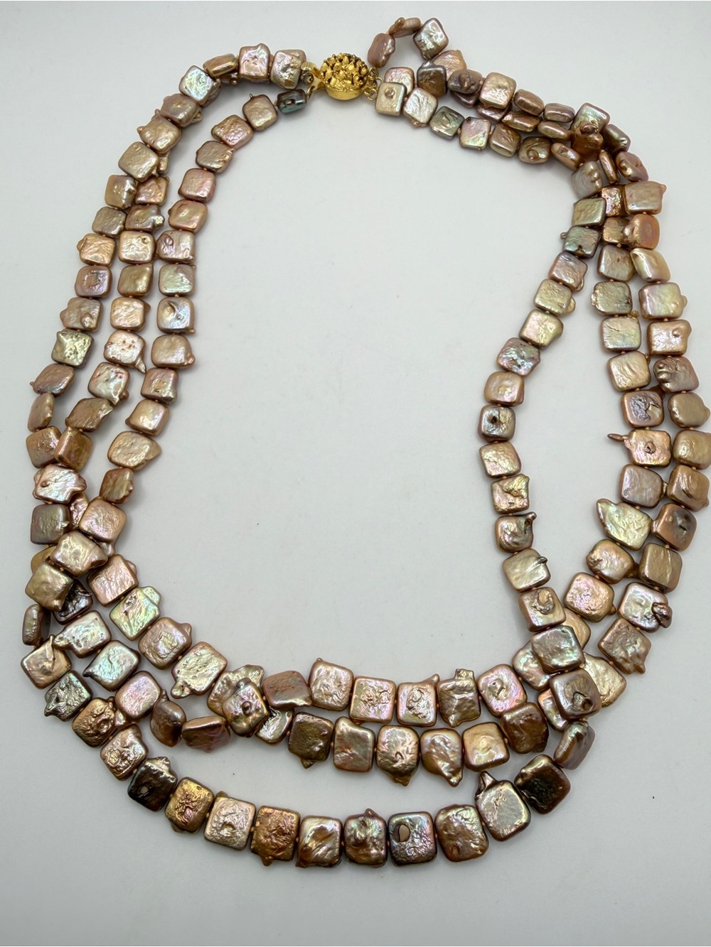 20" of Three Stranded Square freshwater pearl necklace w/ gold tone box clasp!